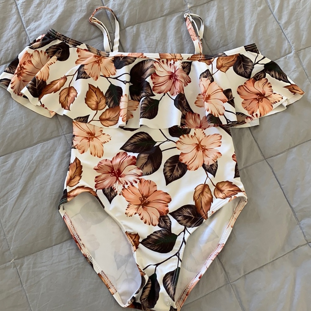 White with floral bathing suit